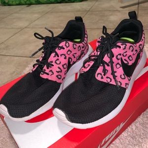 Pink cheetah Nike running shoes